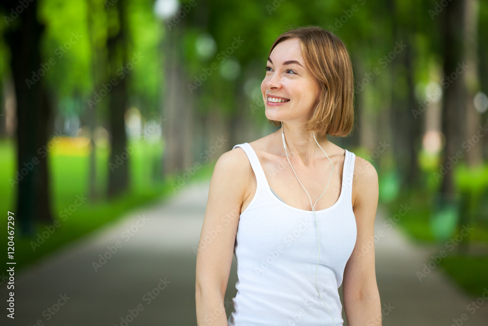 Portrait of happy fitness woman ready to start workout. Portrait of happy fitness woman ready to start workout.