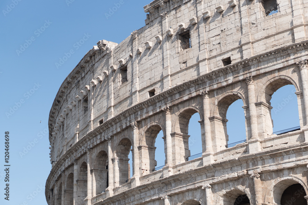 Rome, Italy - July 8, 2016: the Colosseum or Coliseum, Flavian Amphitheatre, is an oval amphitheatre in the centre of Rome, Italy. Built of concrete and sand, it is the largest amphitheatre ever built