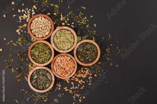 Assortment of dry tea in little bowls