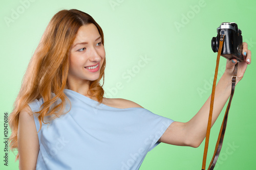 Woman photographer with camera