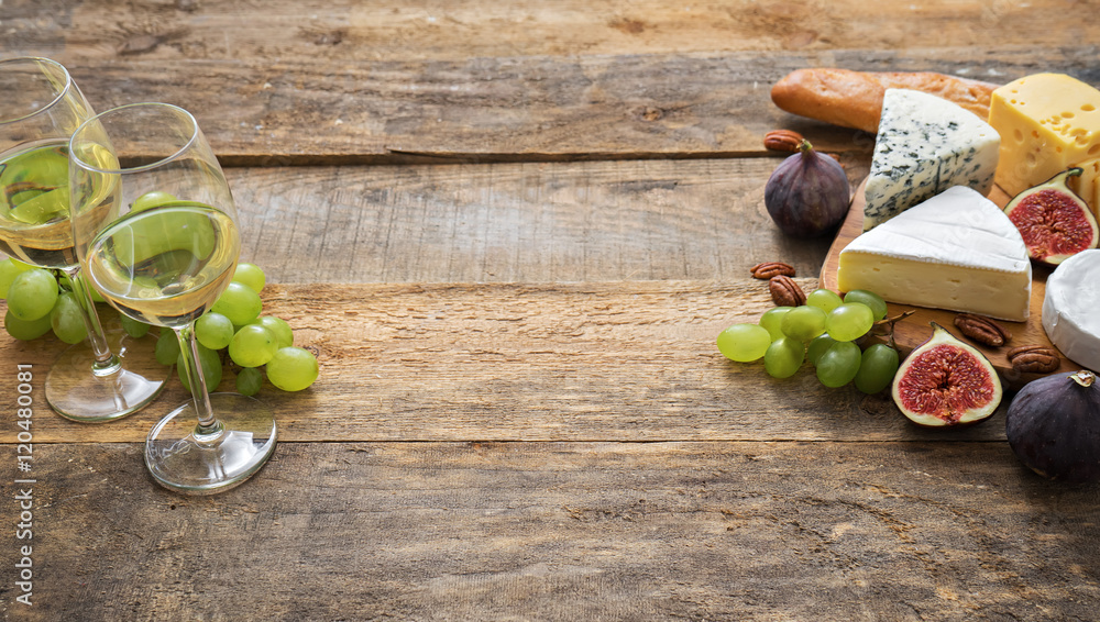 wine and snacks on wooden table wine and snacks on wooden table