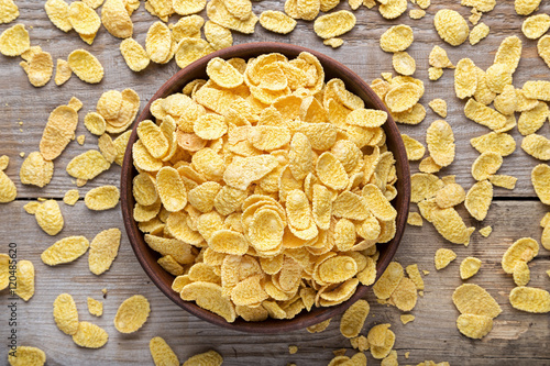 Bowl with Cornflakes . on a wooden surface