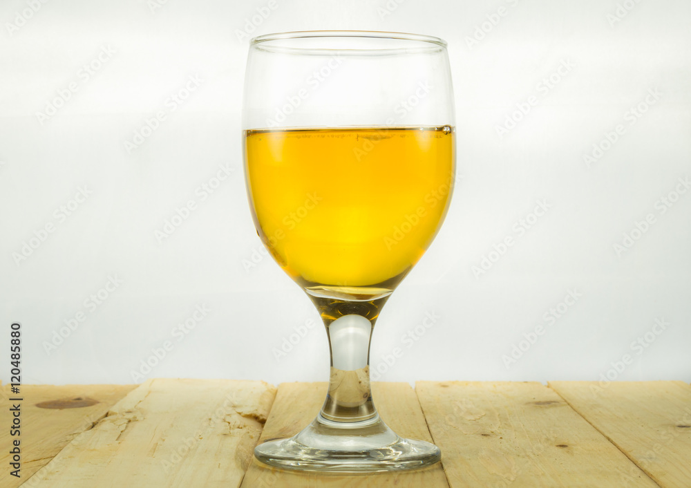 Beer in water goblet on white background Beer in water goblet on white background