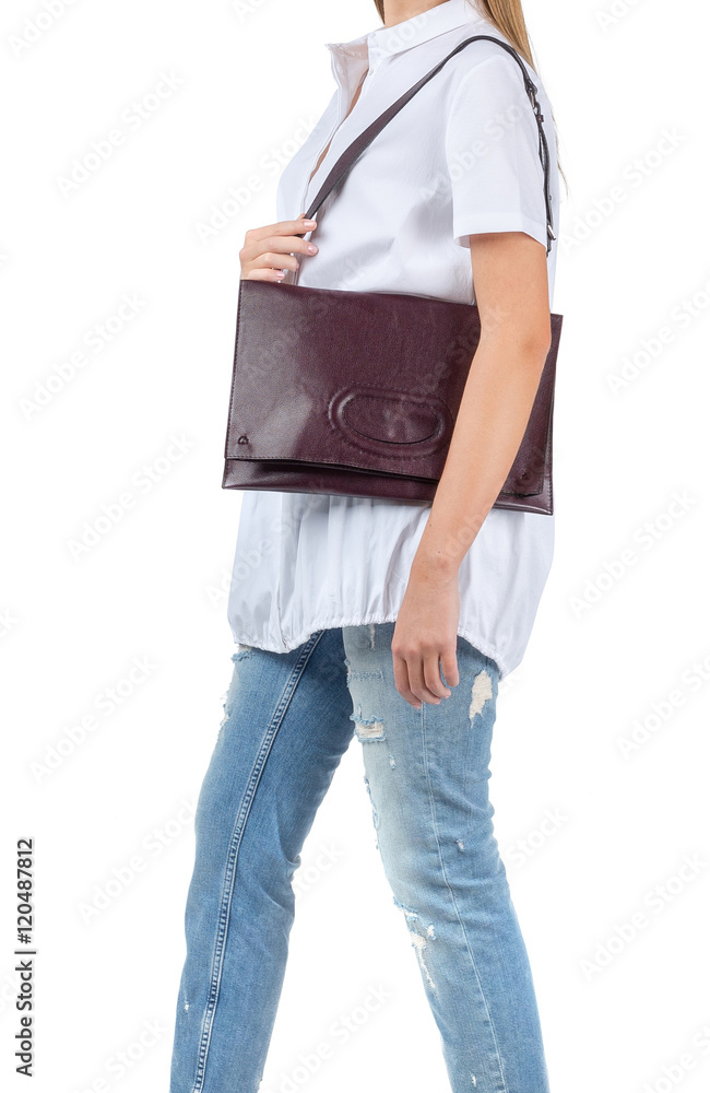 Naklejka premium Woman holding a handbag isolated on white background