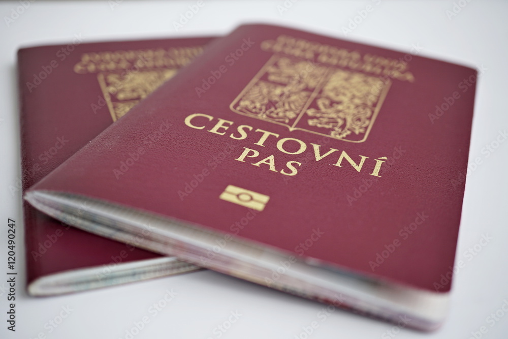 Two isolated red Czech passport with a state symbols (lions and eagles) and captions Czech Republic and European Union in Czech language Two isolated red Czech passport with a state symbols (lions and eagles) and captions Czech Republic and European Union in Czech language