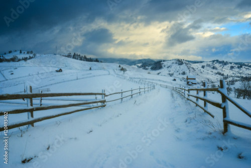Road through the Carpathian winter valley
