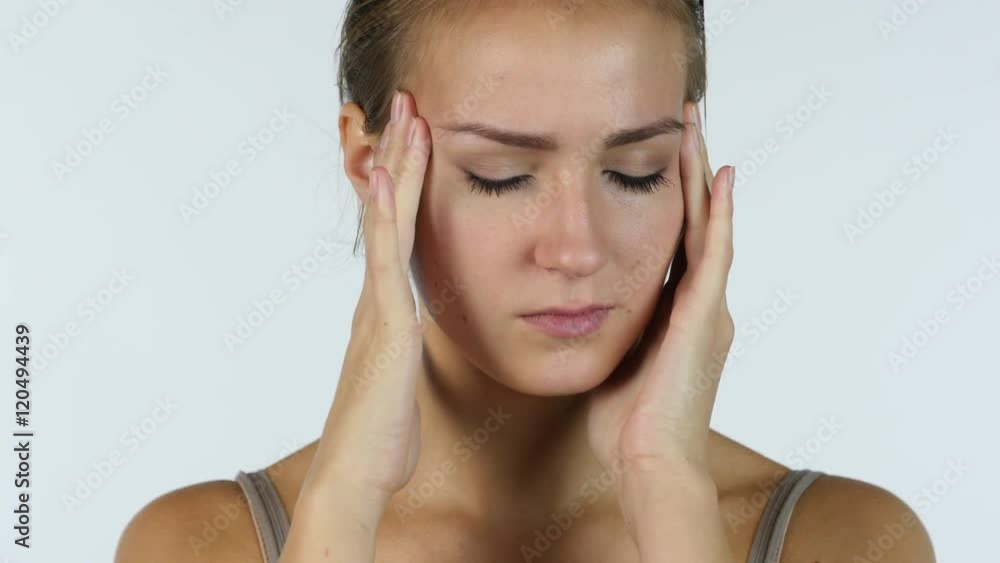 Headache, Close up of Crying Beautiful Girl, White Background Headache, Close up of Crying Beautiful Girl, White Background