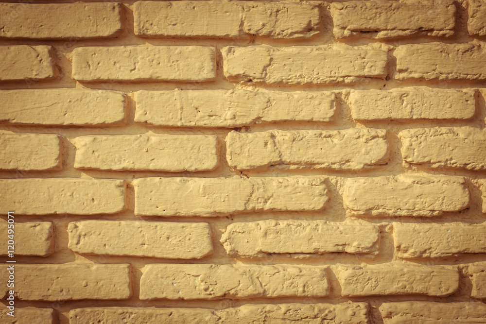 Fototapeta premium yellow brick wall for background