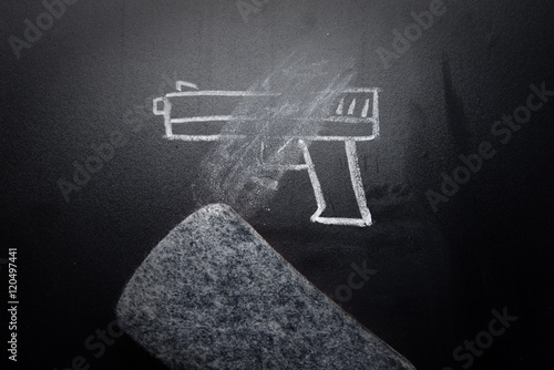 weapon draw erased on blackboard - no violence concept