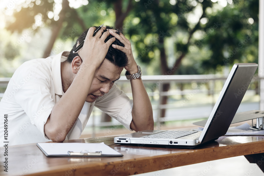 Business man working with stress at outside office with laptop, Business man working with stress at outside office with laptop,
