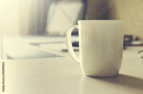 Mug coffee on table.