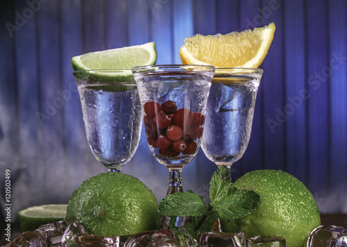 Cold alcohol set with background and fruits