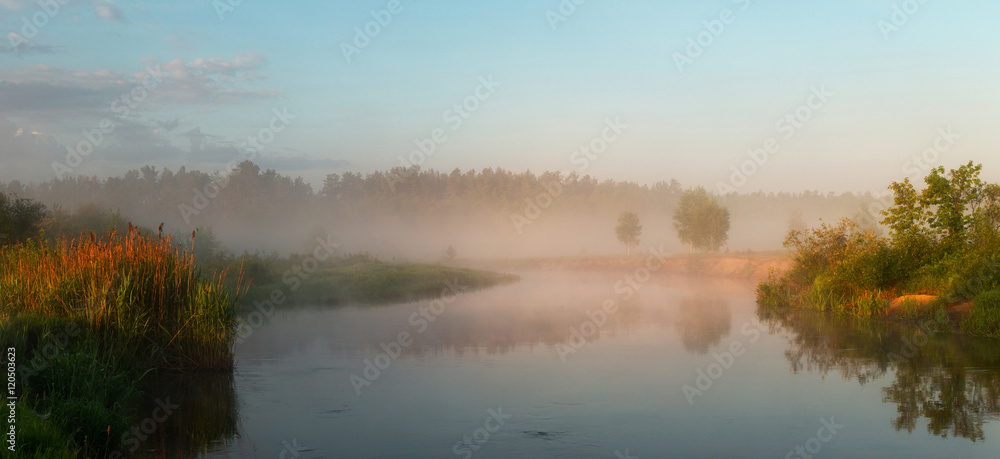 Autumn misty morning on the lake