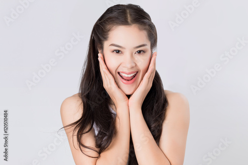 Young Asian woman with surprised excited happy screaming. Cheerf