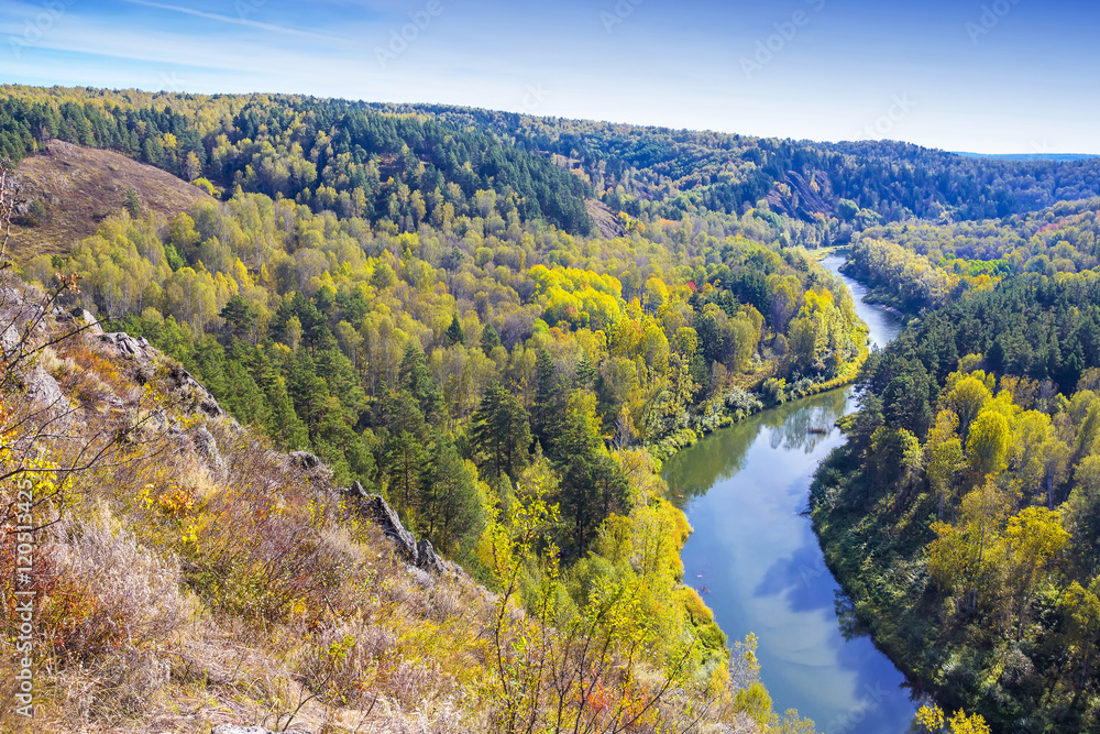 Autumn landscape. View of the Siberian river Berd, from the rock
