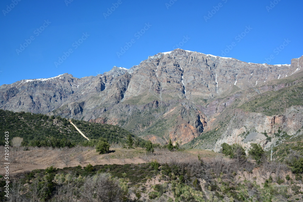 landscape of volcanoes and valley in Chile