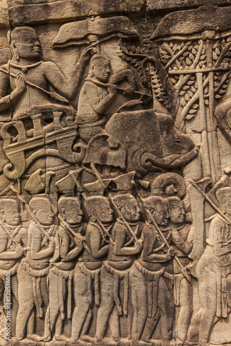 Bas-reliefs with war scenes in Bayon temple, Angkor, Cambodia