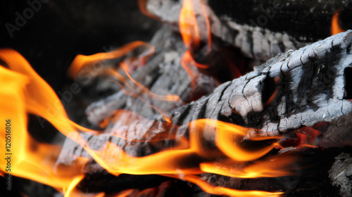 Red embers and fire flames closeup royalty free stock photo
