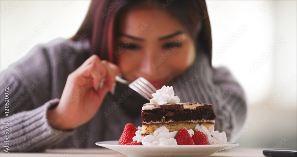 Chinese woman smelling her cup of tea Chinese woman smelling her cup of tea