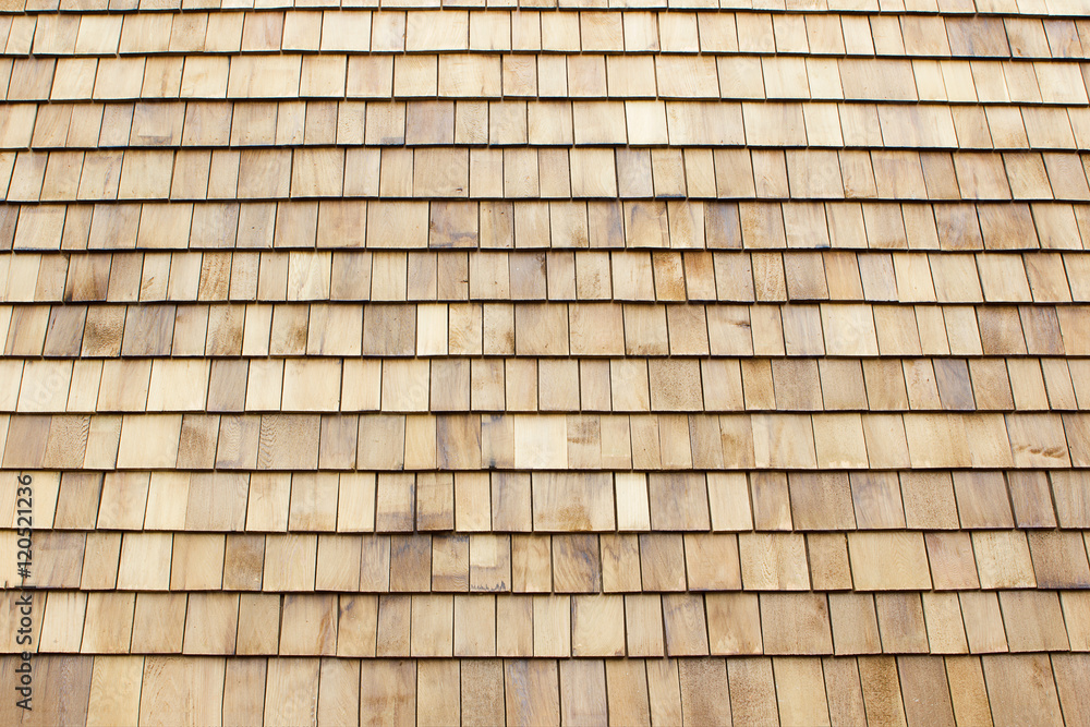 Close up of brown wood roof shingles.Wood background. Close up of brown wood roof shingles.Wood background.