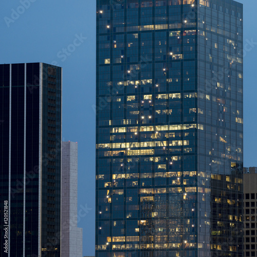 Modern skyscraper at night, Victory Park, Dallas, Texas, USA photo