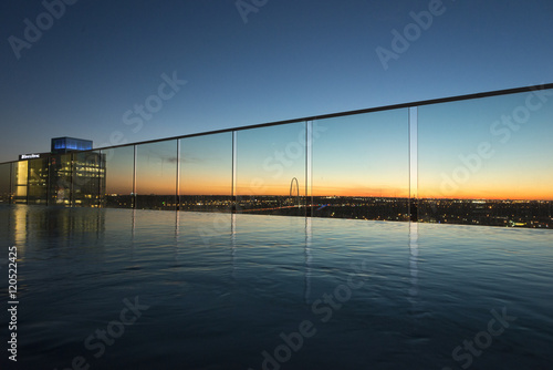 View of infinity pool at dusk, Victory Park, Dallas, Texas, USA photo