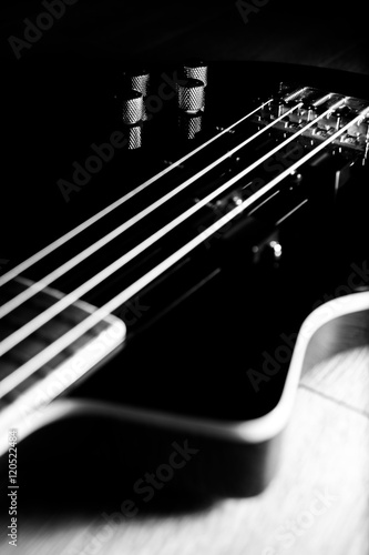 Photography Body of a classic black bass guitar
