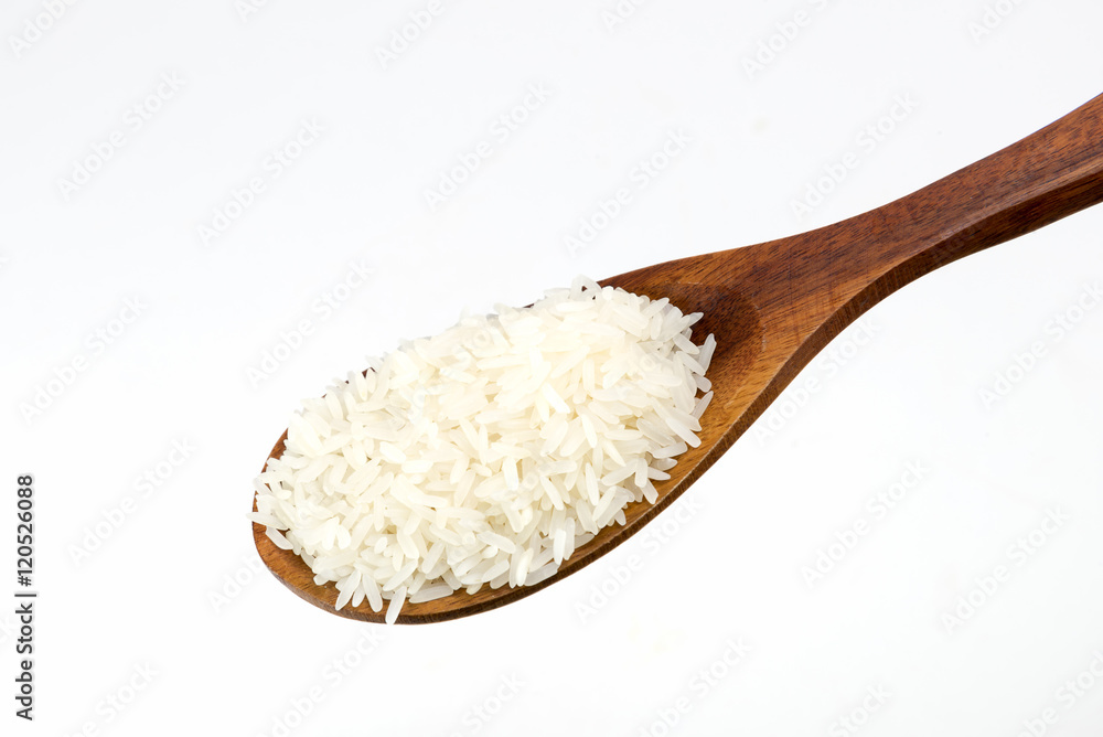 white rice in wooden spoon white rice in wooden spoon