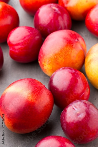 Fresh fruit on the gray background.