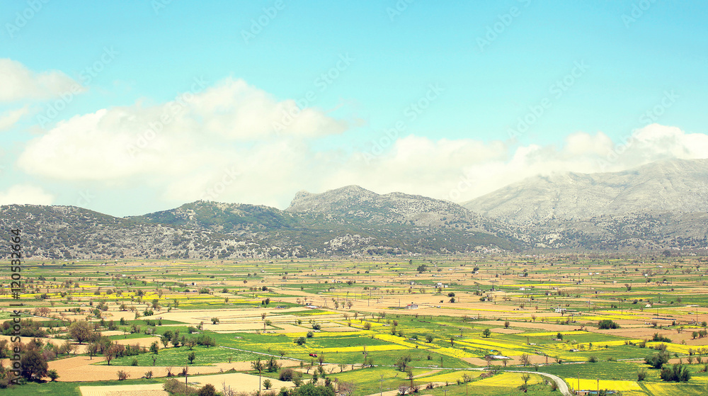 Amazing landscape of valley with fields on the background mounta