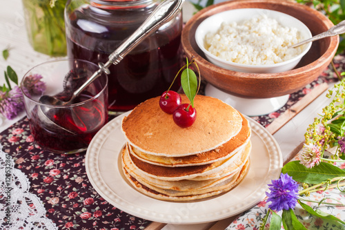 pancakes with cherry flowers still life summer