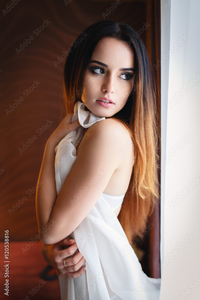 Beautiful girl in a sexy white lingerie Beautiful girl in a sexy white lingerie
