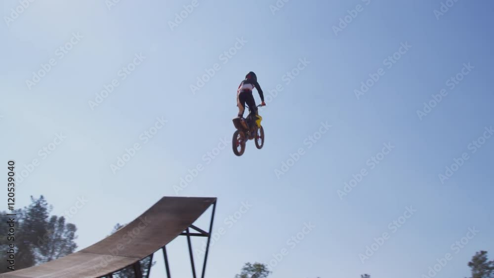 Slow Motorcross Rider Motocross rider going off big jump, slow motion, 4K shot on RED Epic ...