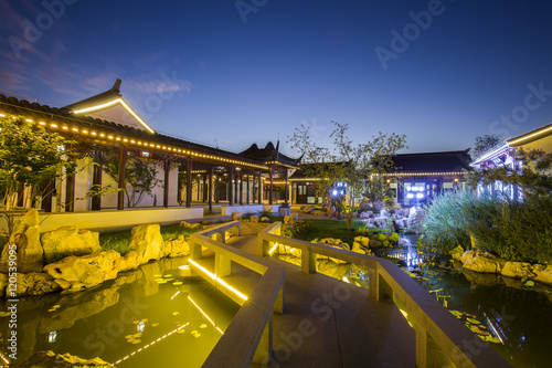 Chinese traditional buildings at night © zhengzaishanchu