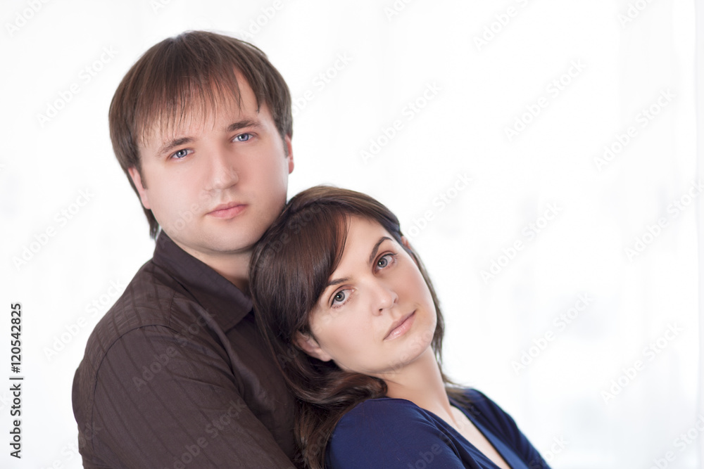 Portrait of Young Caucasian Family Standing Together Embraced. Portrait of Young Caucasian Family Standing Together Embraced.