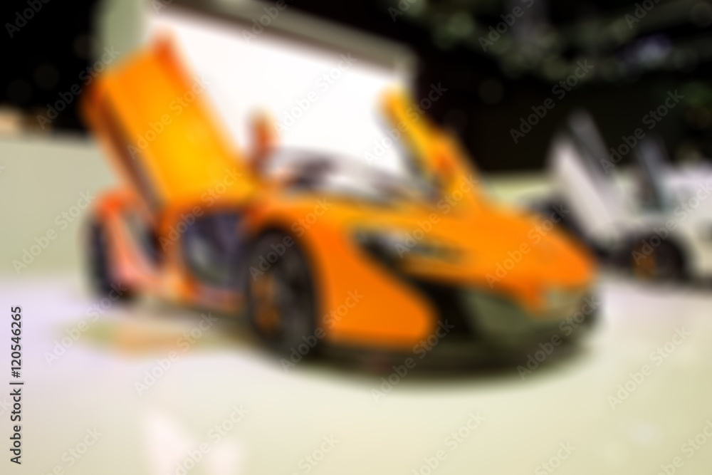 Blur of modern car in the showroom for background