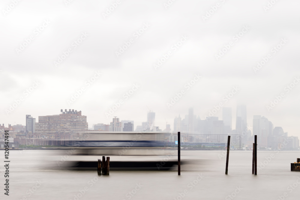 East River Ferry coming in for docking on a foggy day.