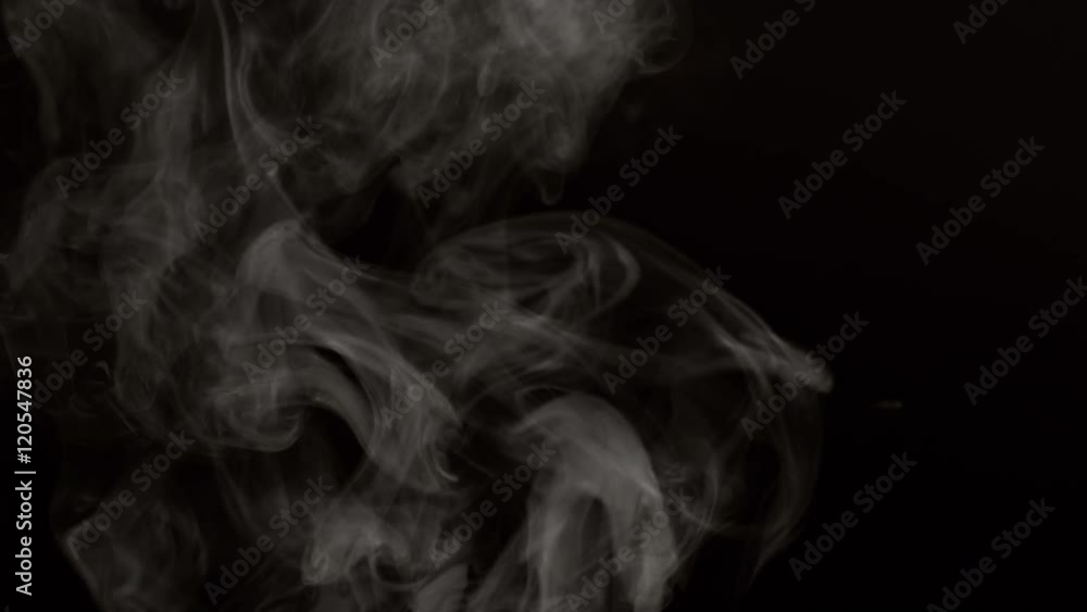 Steam on black background in slow motion, shot with Phantom Flex 4K at 1000 frames per second Steam on black background in slow motion, shot with Phantom Flex 4K at 1000 frames per second