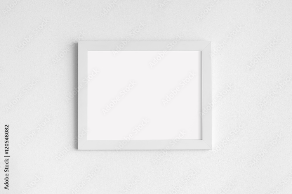 Blank Frame on White Wall Background Blank Frame on White Wall Background