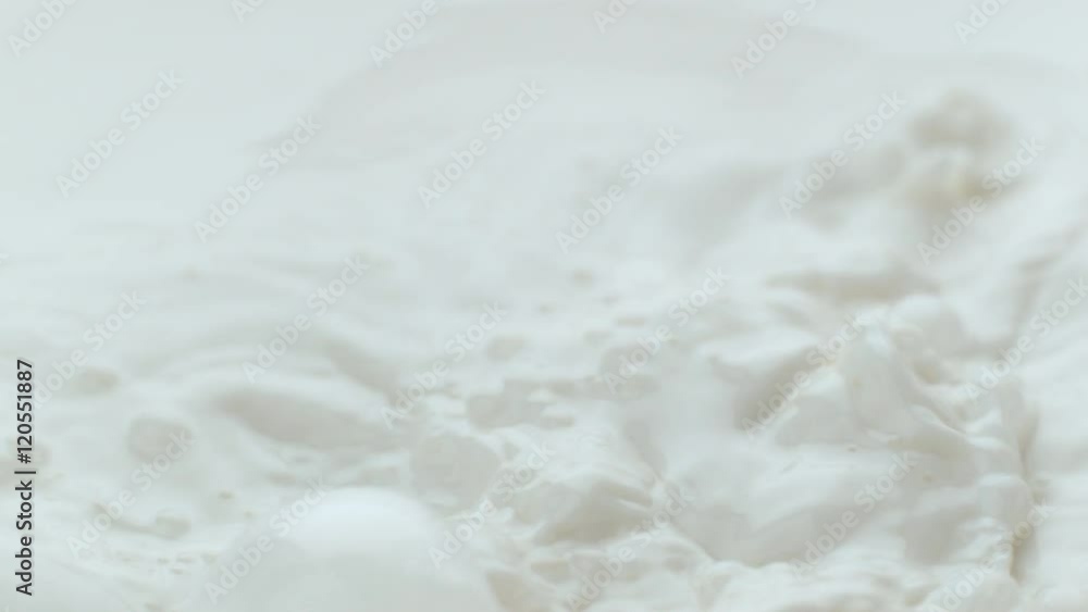 Milk pouring and splashing in slow motion; shot on Phantom Flex 4K at 1000 fps Milk pouring and splashing in slow motion; shot on Phantom Flex 4K at 1000 fps