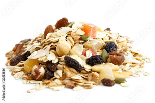 Heap of premium fruit and nut muesli isolated on white. photo