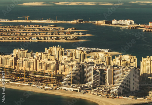 Scenic panoramic view of Palm Jumeirah in Dubai, UAE. Aerial view. Travel background.