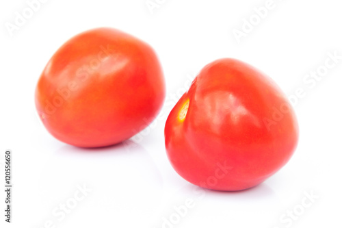 Closeup fresh red tomatoes on white background, food and vegetab
