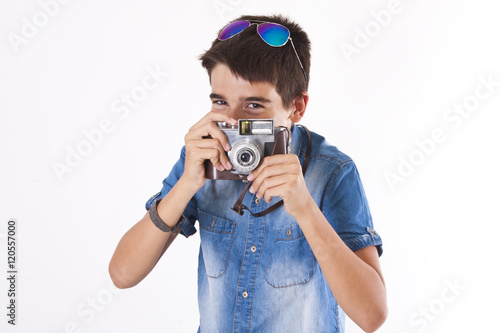 young boy with vintage photo camera