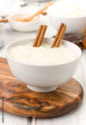 bowls of rice pudding, on wood