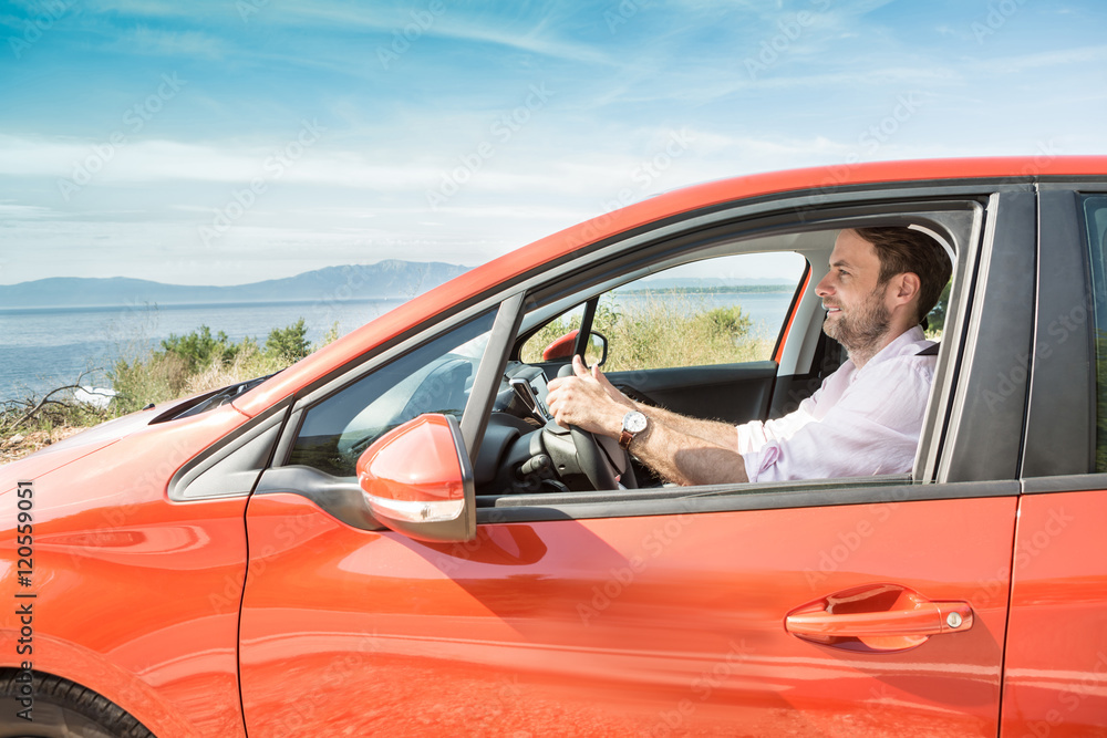 Forty years old caucasian man driving a car Forty years old caucasian man driving a car