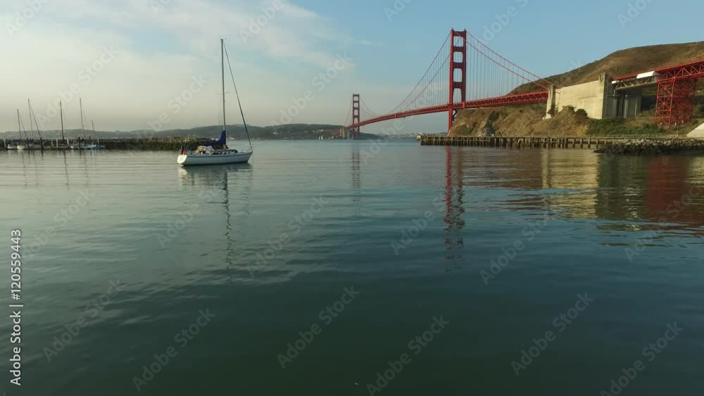 Sailboat and Golden Gate Bridge in San Fransisco, California, aerial shot Sailboat and Golden Gate Bridge in San Fransisco, California, aerial shot