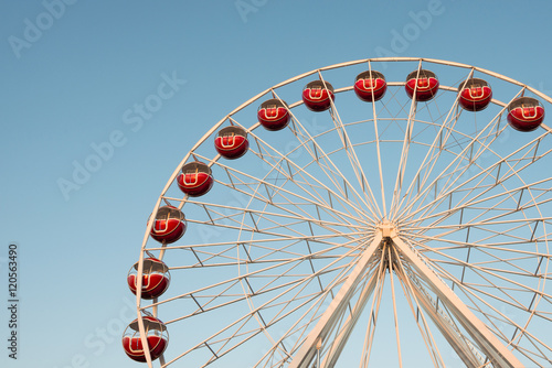 Ferris wheel on blue sky