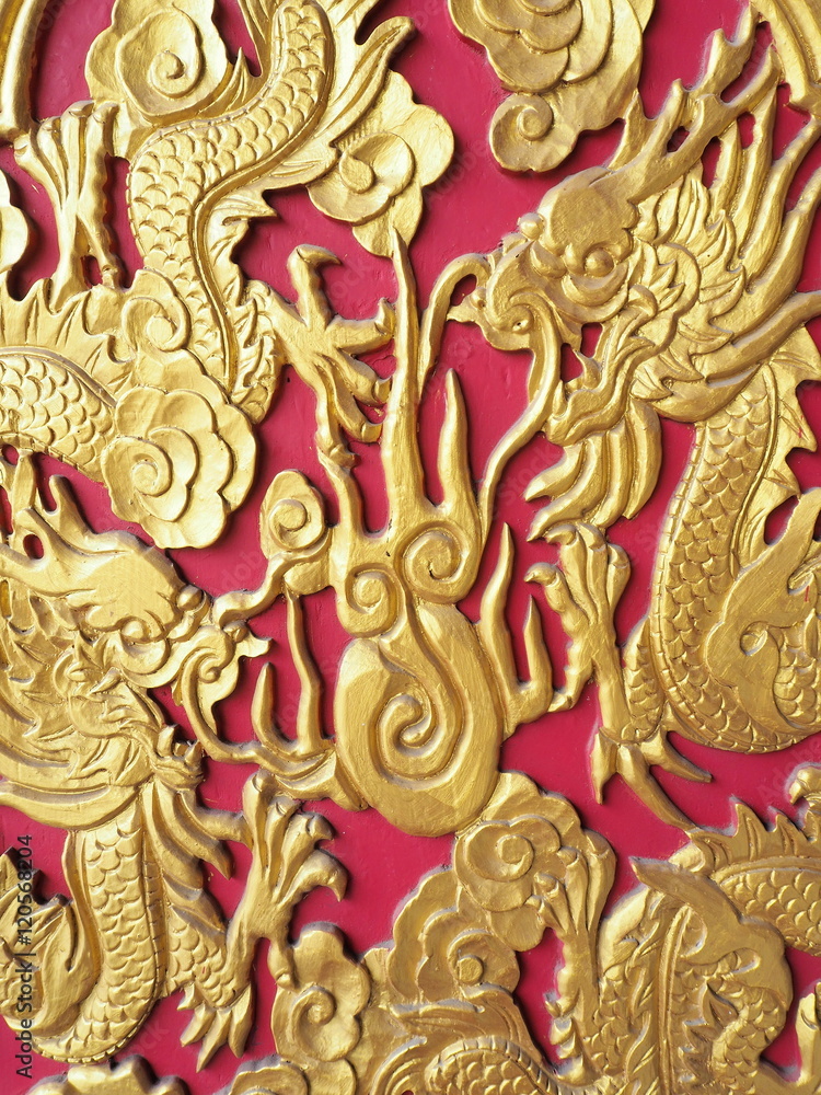 Fototapeta premium Decorative door dragon,Patterned wooden door