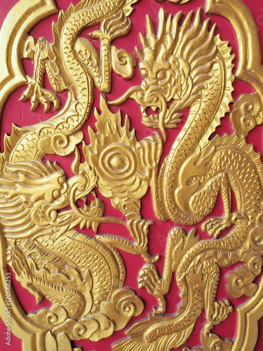 Decorative door dragon,Patterned wooden door © arporn